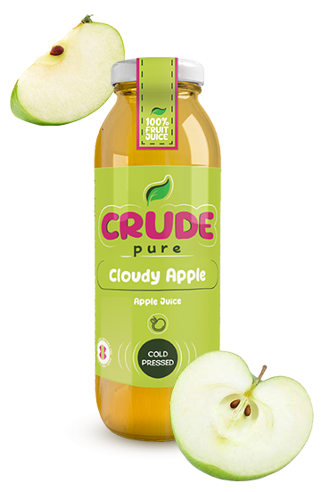 250ml glass bottle of cloudy apple made from cold pressed apple juice. Real half half-cut apple in the background